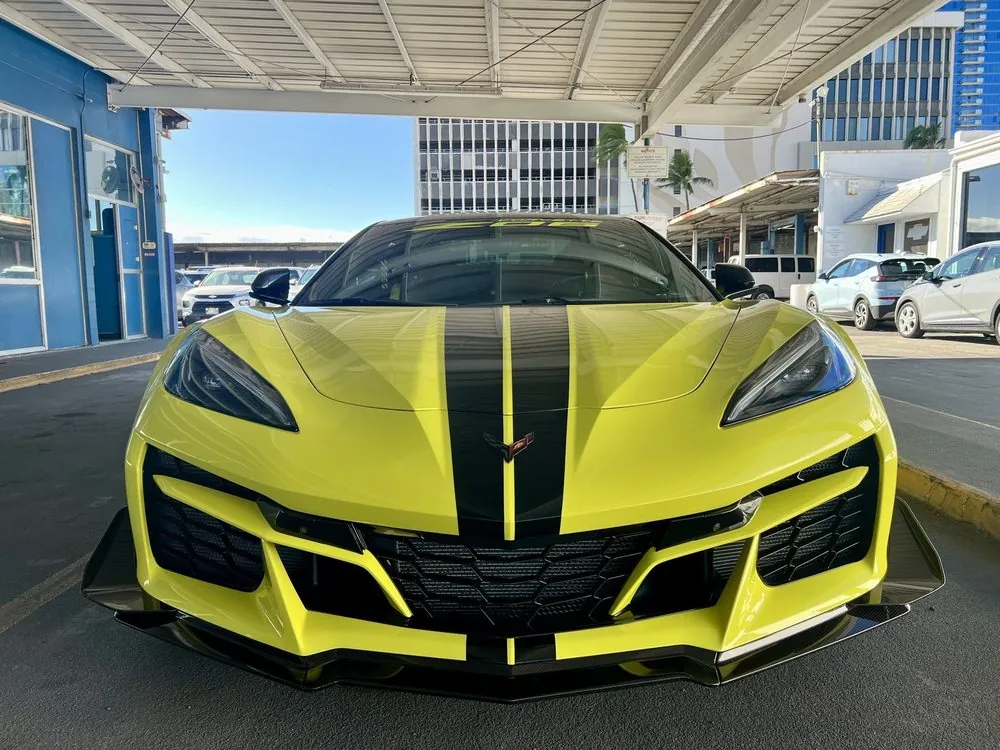 A Corvette Z06 with its front fascia painted to match Accelerate Yellow